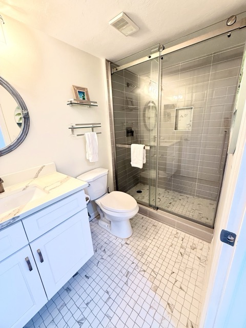 Bathroom with glass walk-in shower